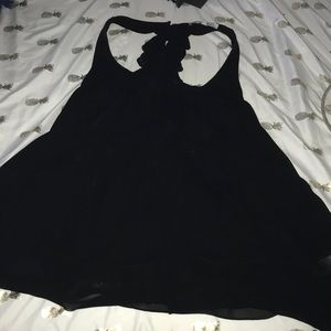 Flouncy black racer-back blouse